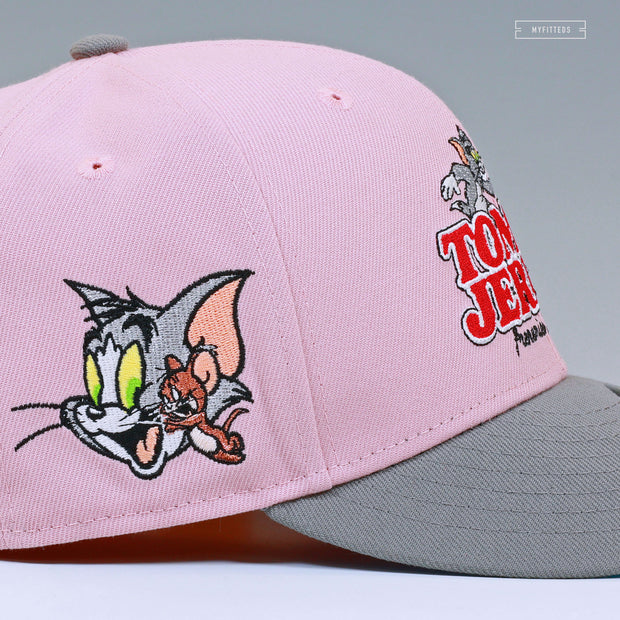 TOM AND JERRY™ 85TH ANNIVERSARY FRENEMIES FOREVER PALE PINK NEW ERA FITTED CAP