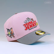 TOM AND JERRY™ 85TH ANNIVERSARY FRENEMIES FOREVER PALE PINK NEW ERA FITTED CAP