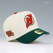 NEW JERSEY DEVILS THE DEVILS LEGION OFF WHITE FIELD GREEN NEW ERA FITTED CAP