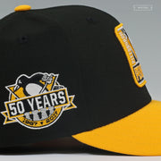 PITTSBURGH PENGUINS 50 YEARS 1960-2017 FRAME IT JET BLACK ARGENT GOLD NEW ERA FITTED CAP